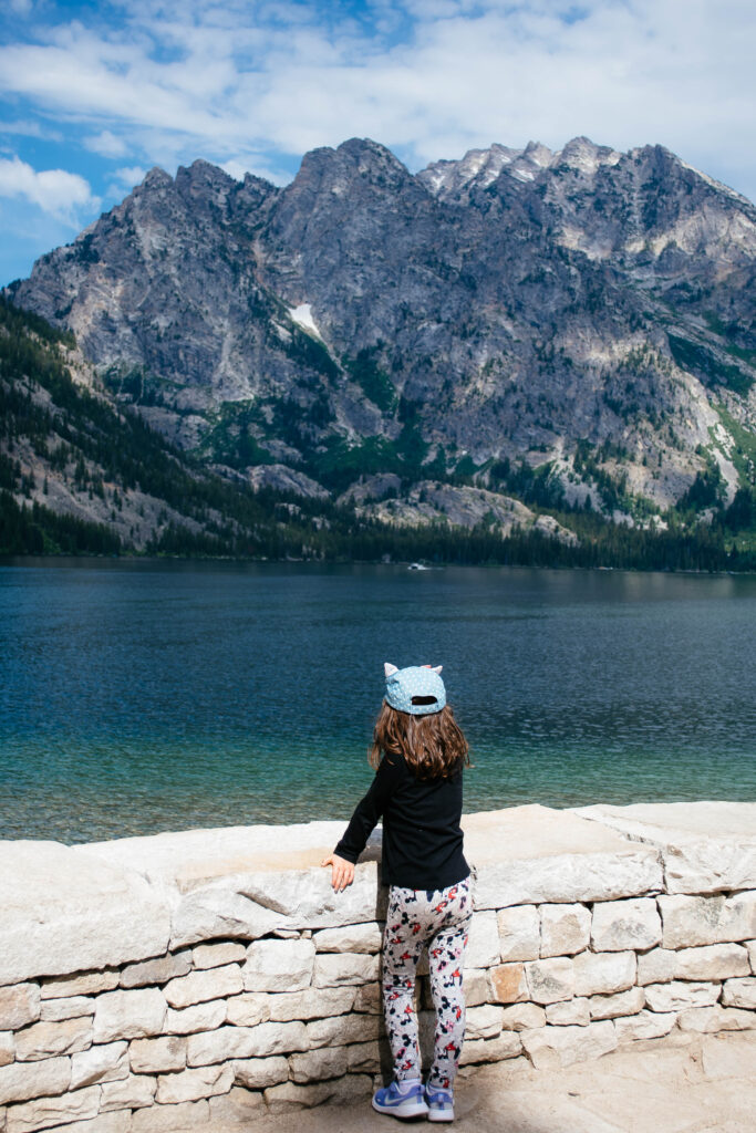 child looking out on Jenny lake