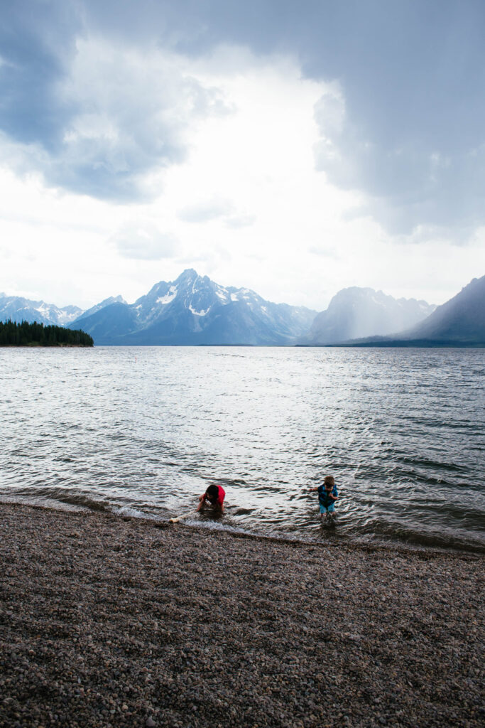 kids playing in water at Jenny lake