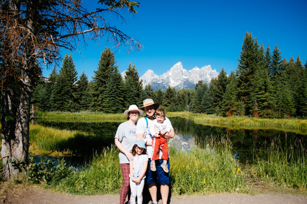 family in front on Grand Teton